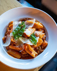 Wooden City Tacoma signature dishes Smoked Salmon Toast
Lamb Bolognese
Spicy Lamb Rigatoni